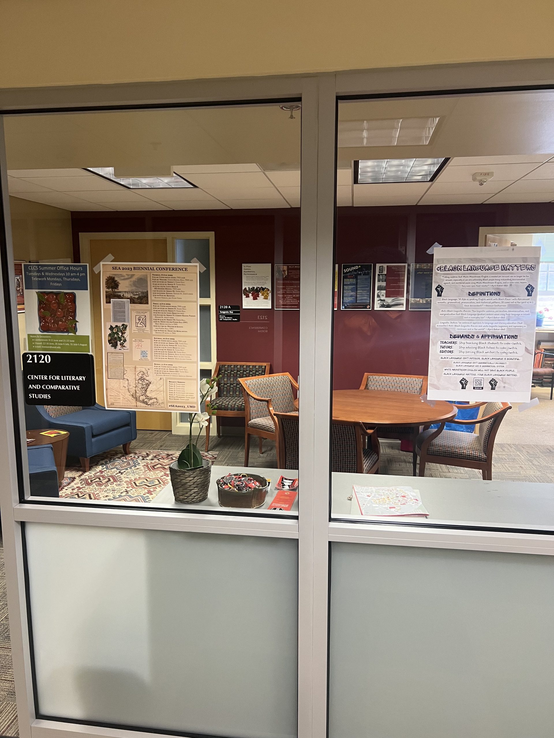 Figure 3: #BlackLanguageMatters poster taped to a window of an office called "Center for Literary and Comparative Studies."