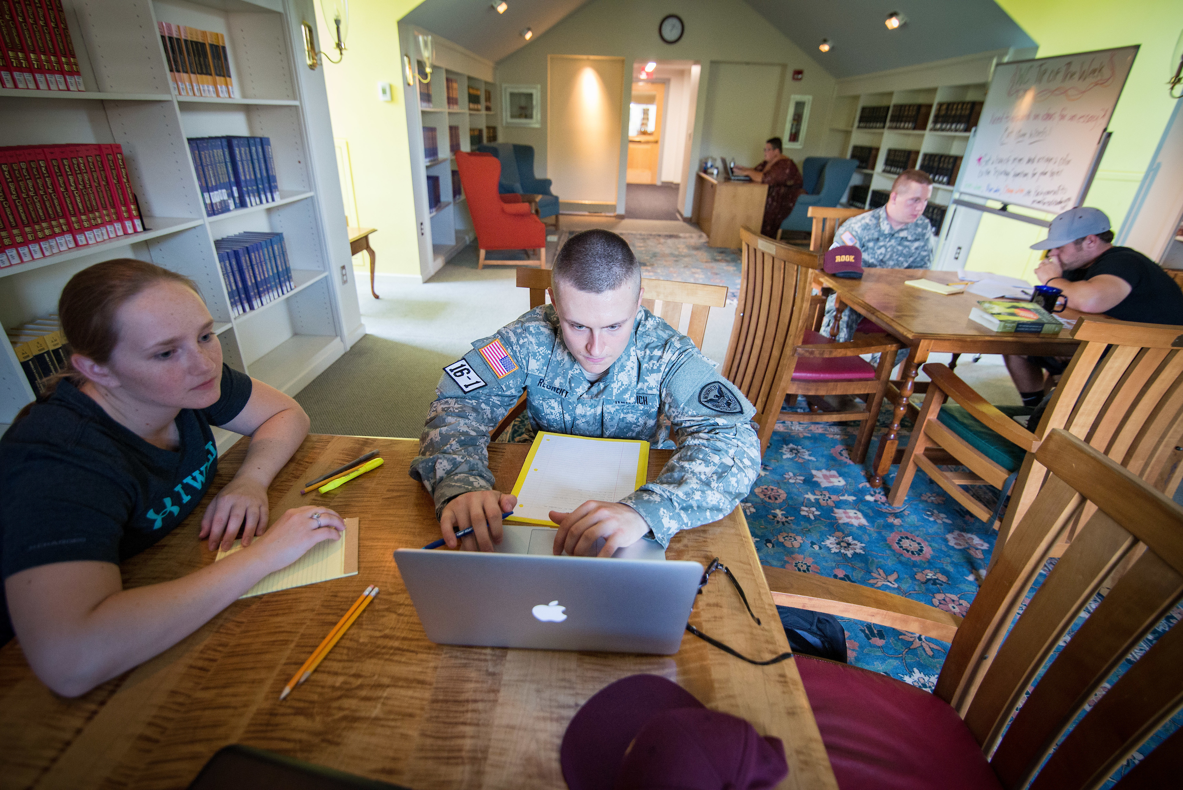 Students being tutored in the writing center.